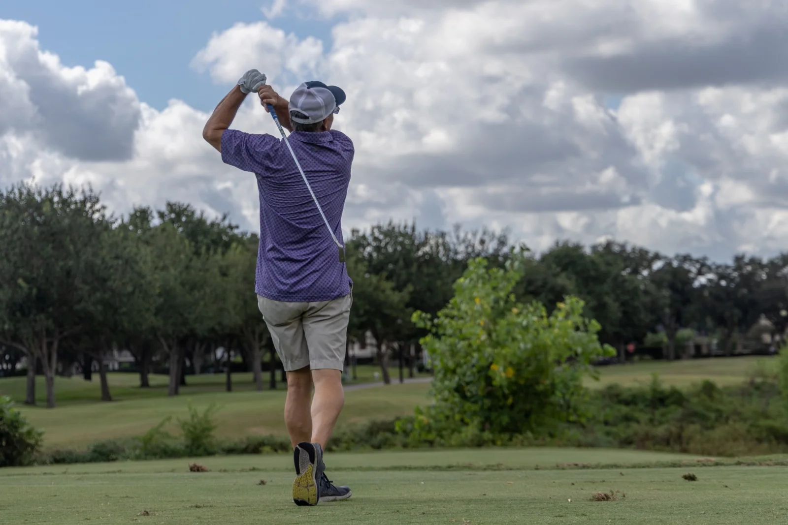Junior golfer photographed at the tee