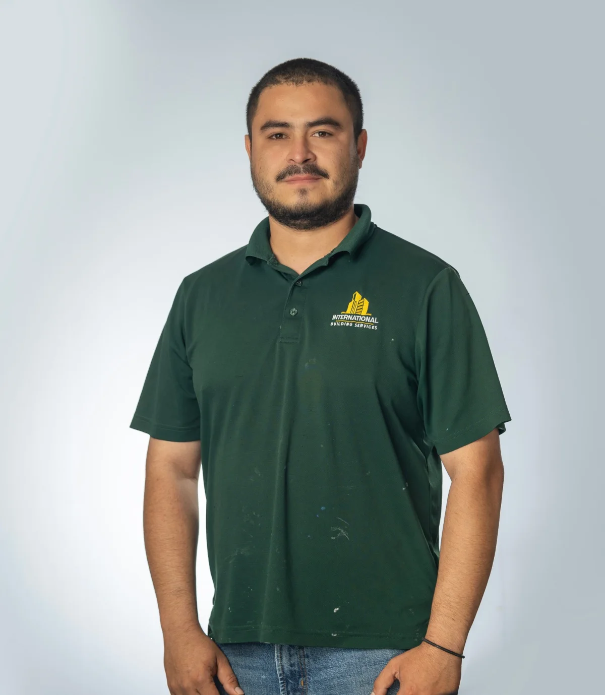IBS employee headshot on a studio backdrop