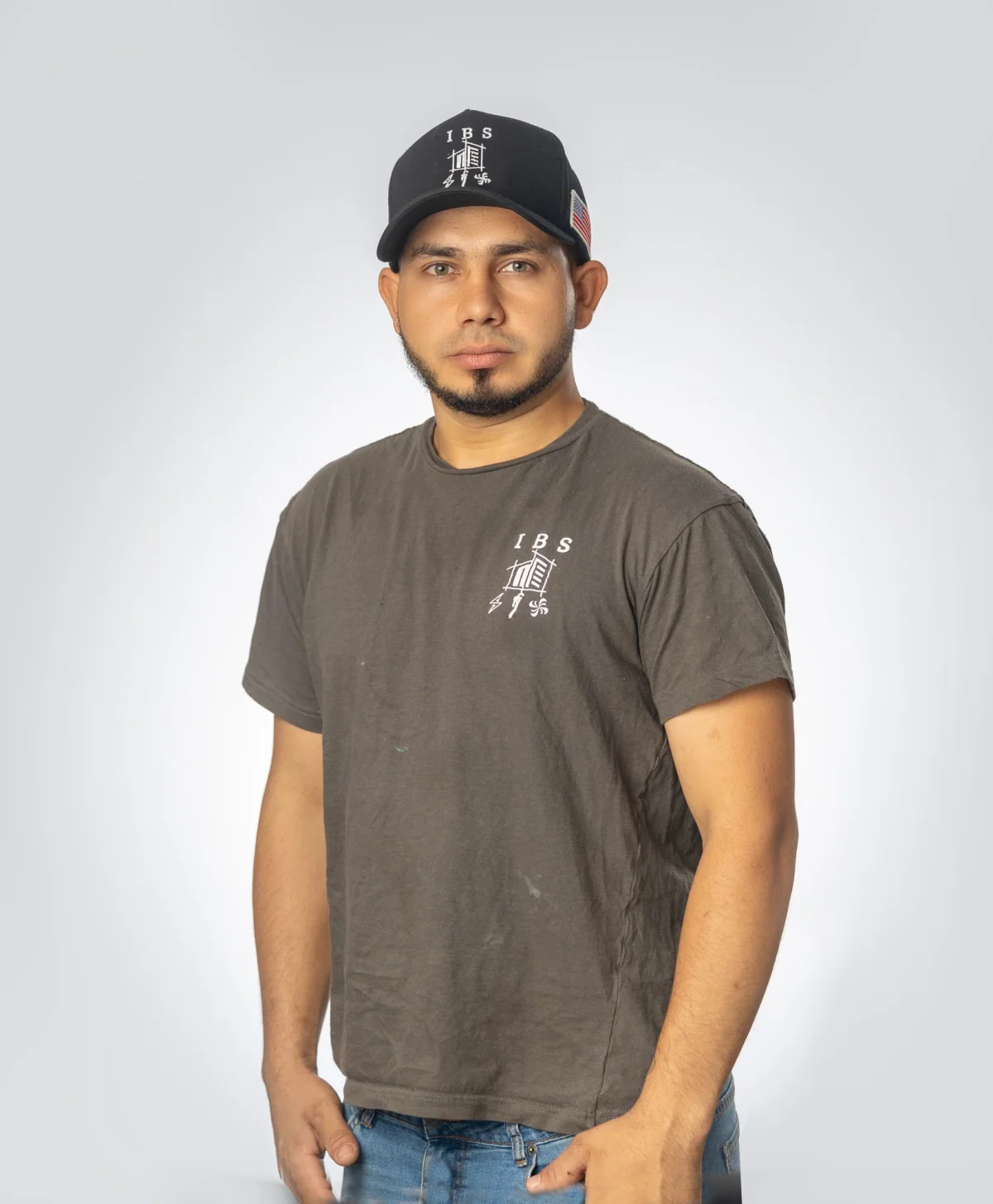 IBS employee headshot on a studio backdrop