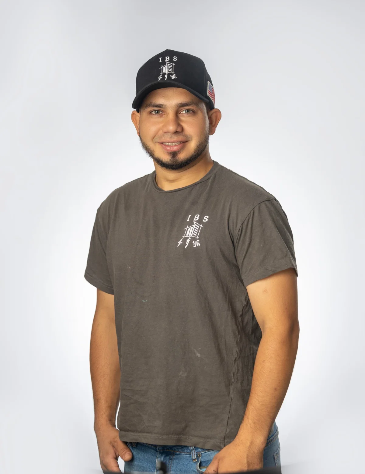 IBS employee headshot on a studio backdrop
