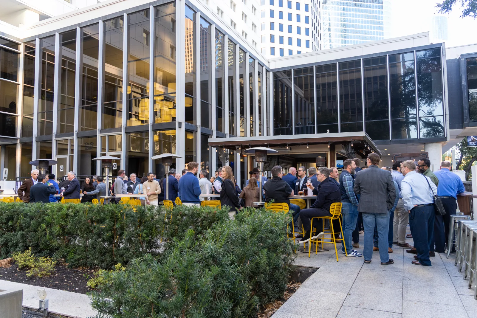 Wide establishing frame of the downtown Houston patio venue before the reception fills